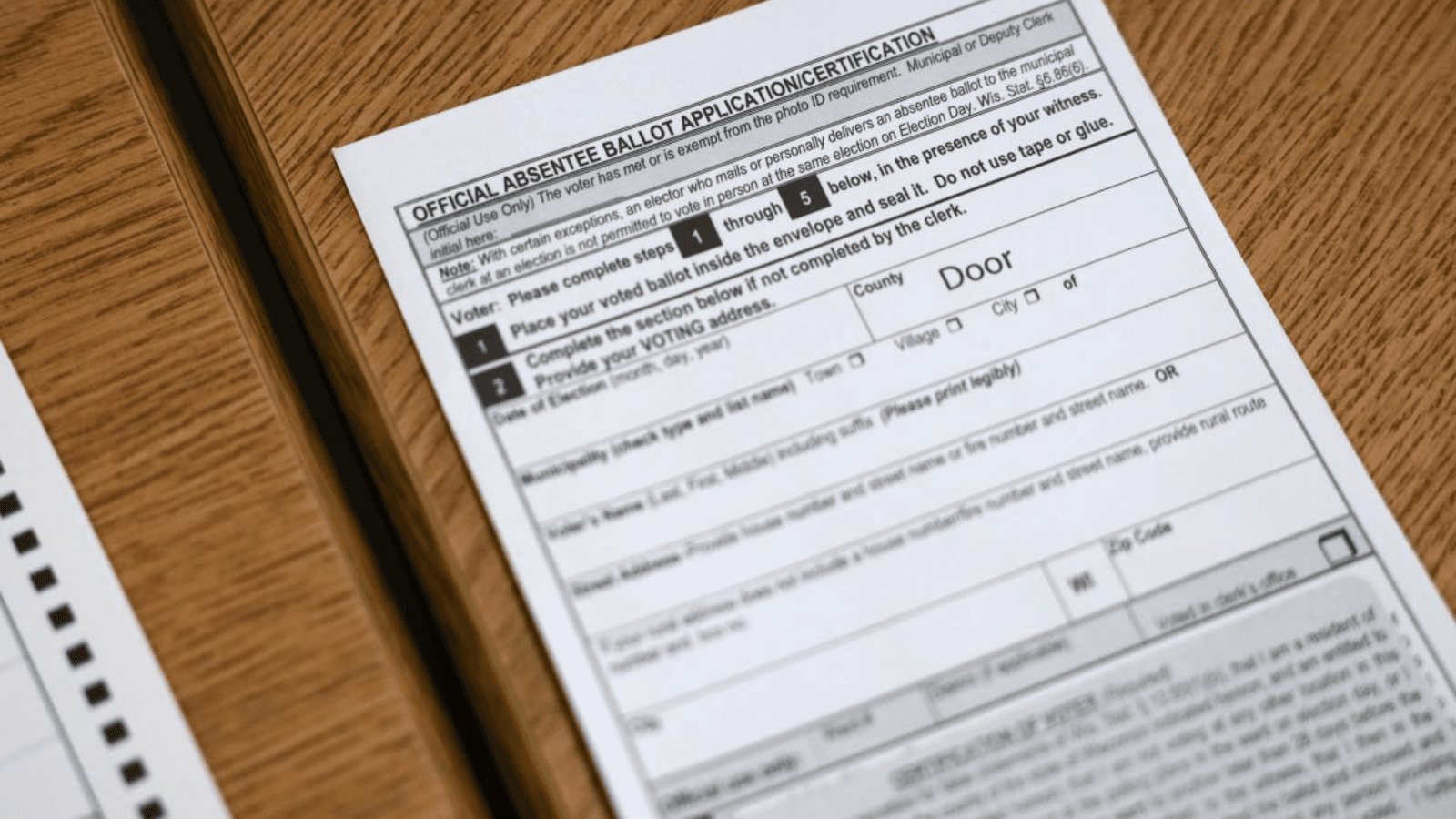 Lawsuit could complicate absentee voting in Wisconsin