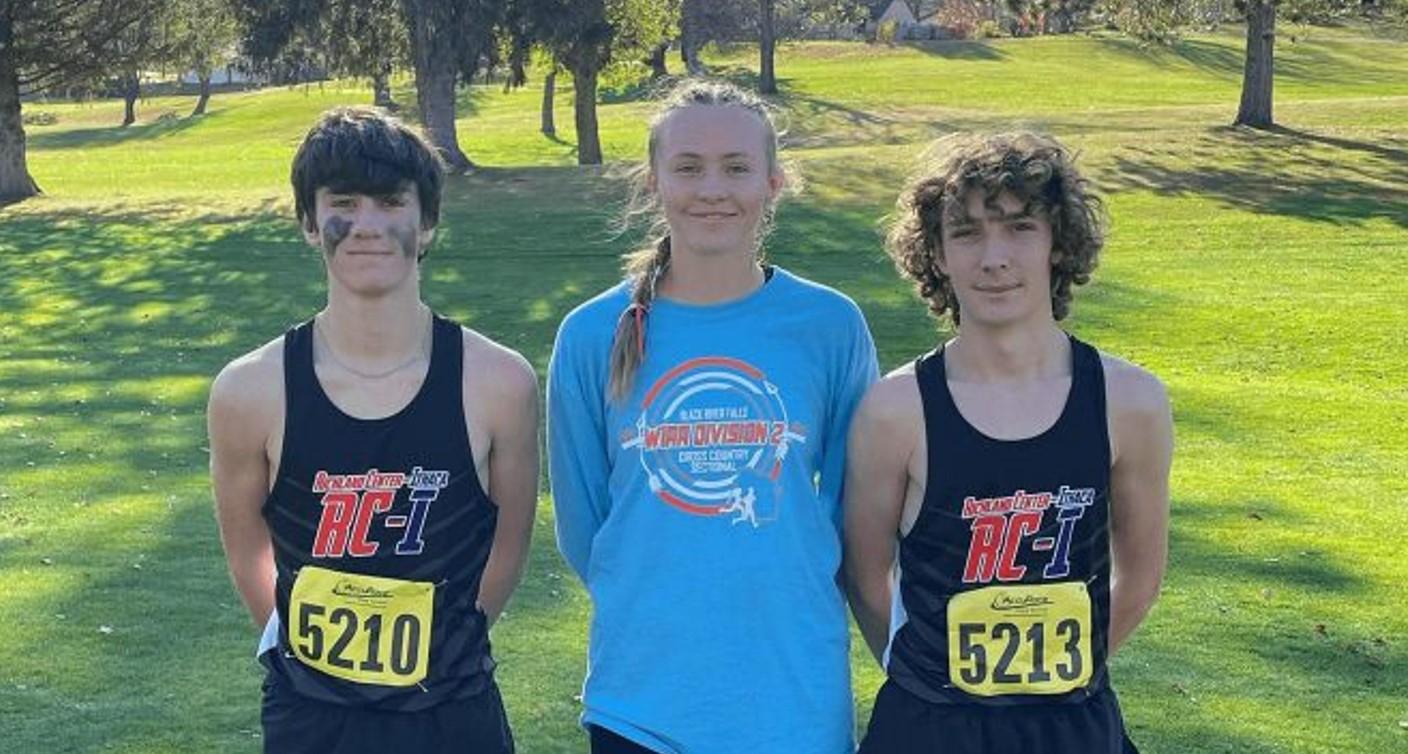 Phil Nee talks with Richland Center/Ithaca Cross Country