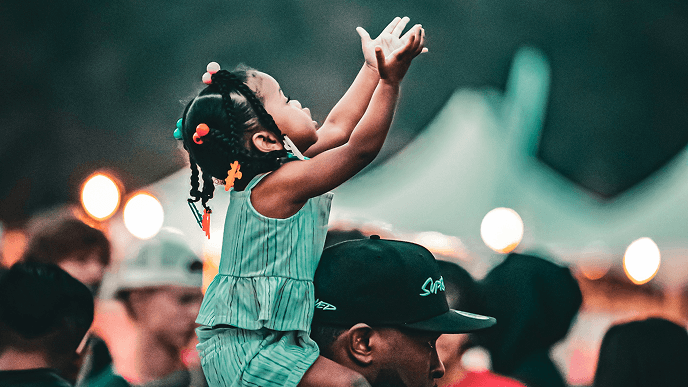 Child reaching for basketball